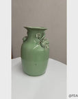 Green Ceramic Vase with Botanical Theme Handles