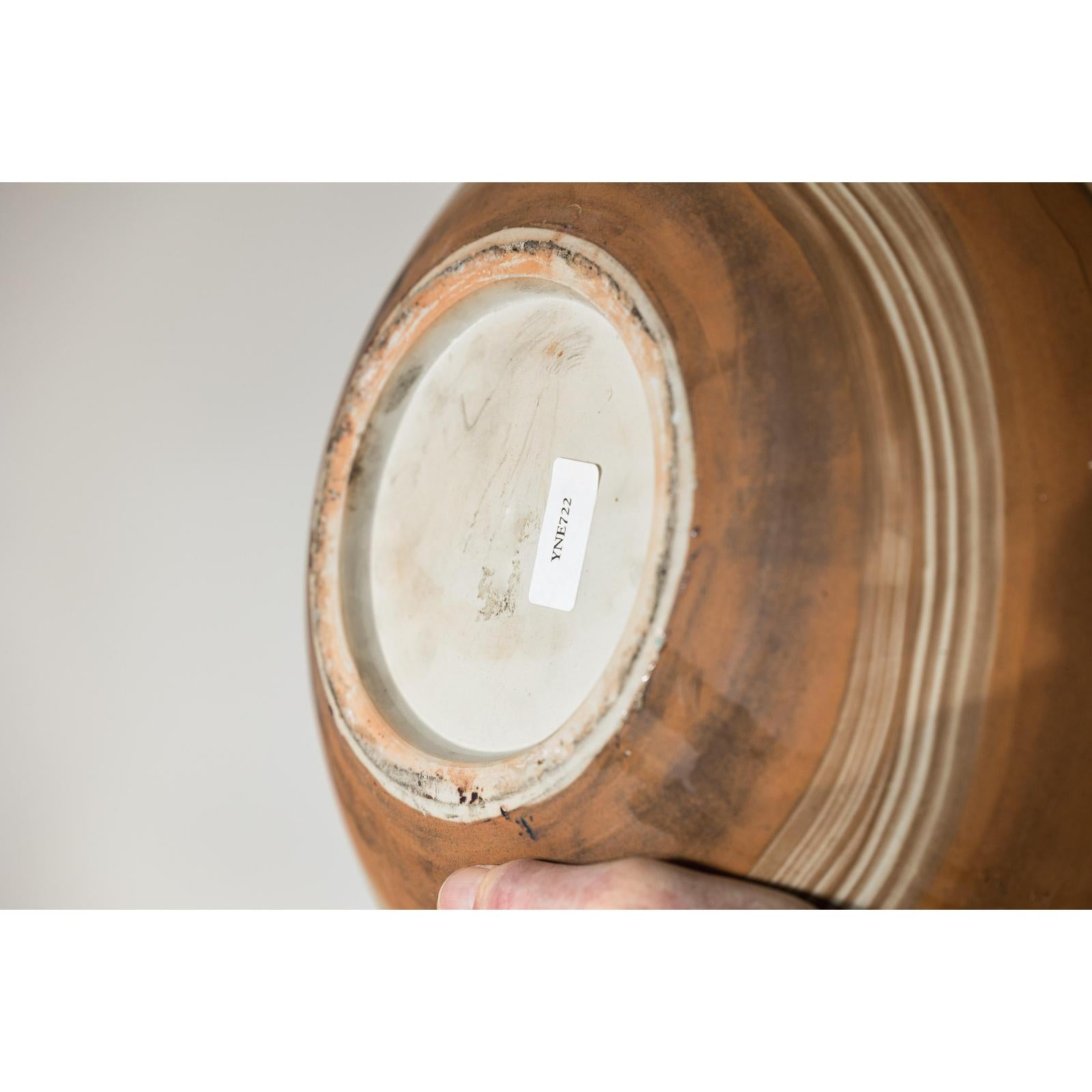 Round Ceramic Artisan Vase with Swirled Earth-Tone Design