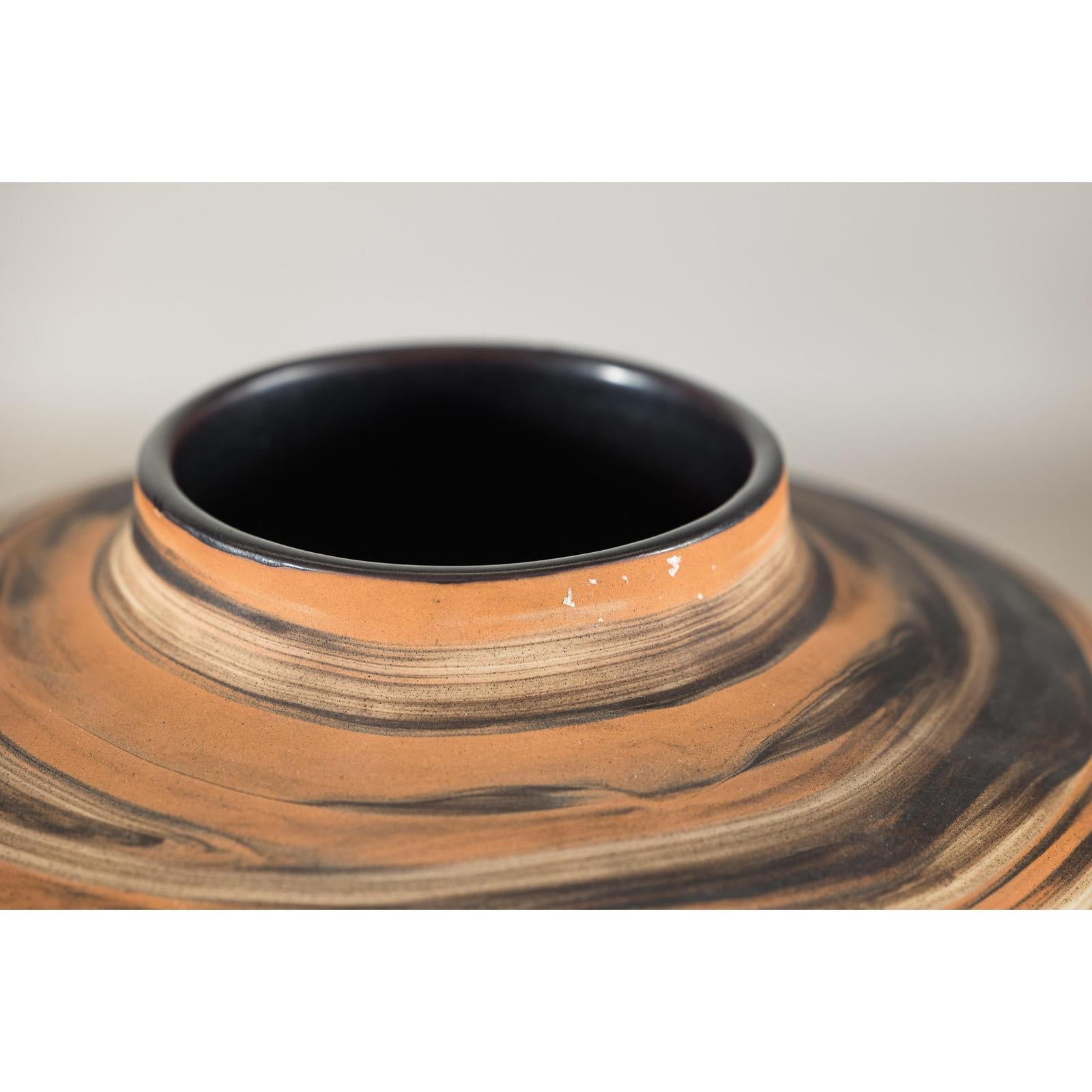Round Ceramic Artisan Vase with Swirled Earth-Tone Design