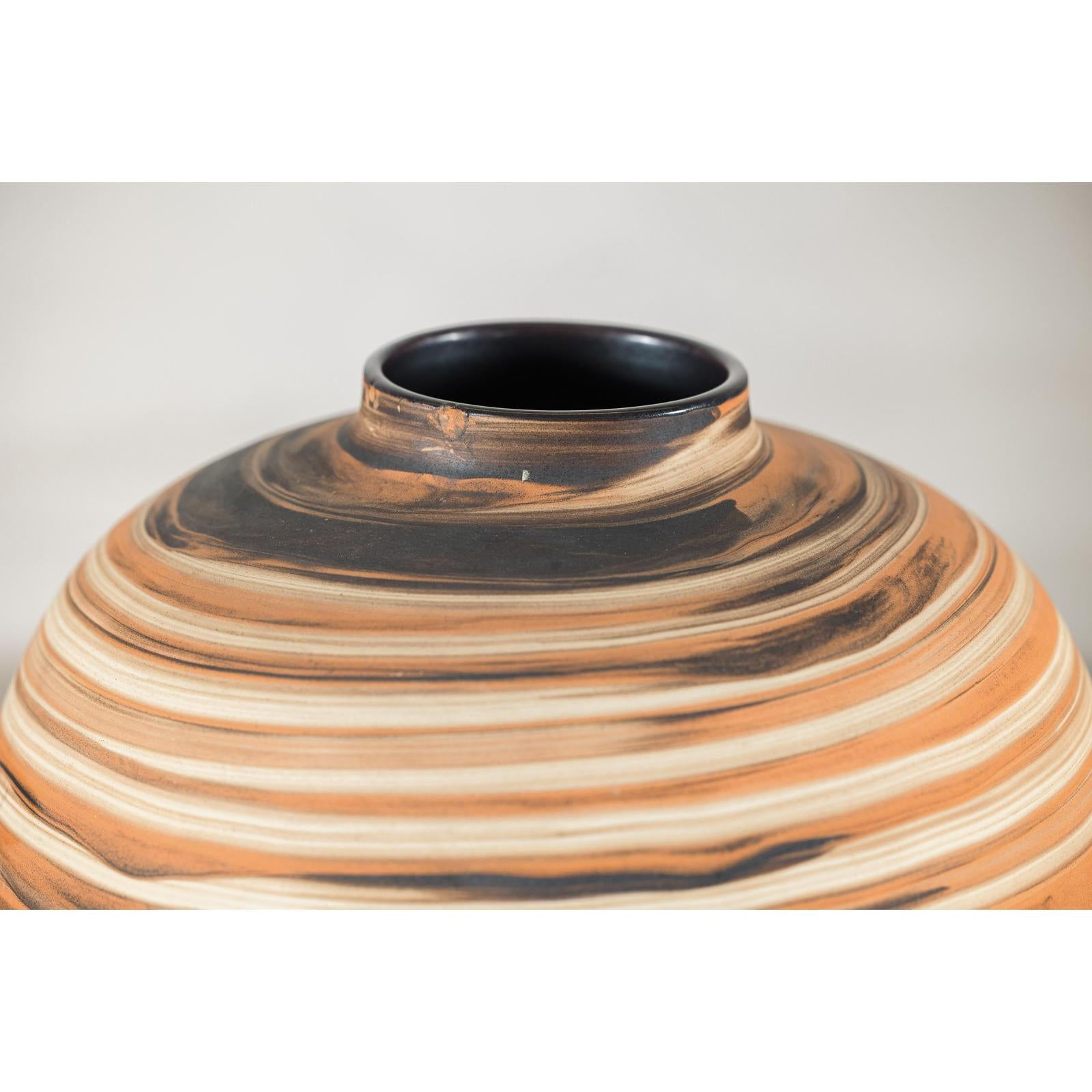 Round Ceramic Artisan Vase with Swirled Earth-Tone Design