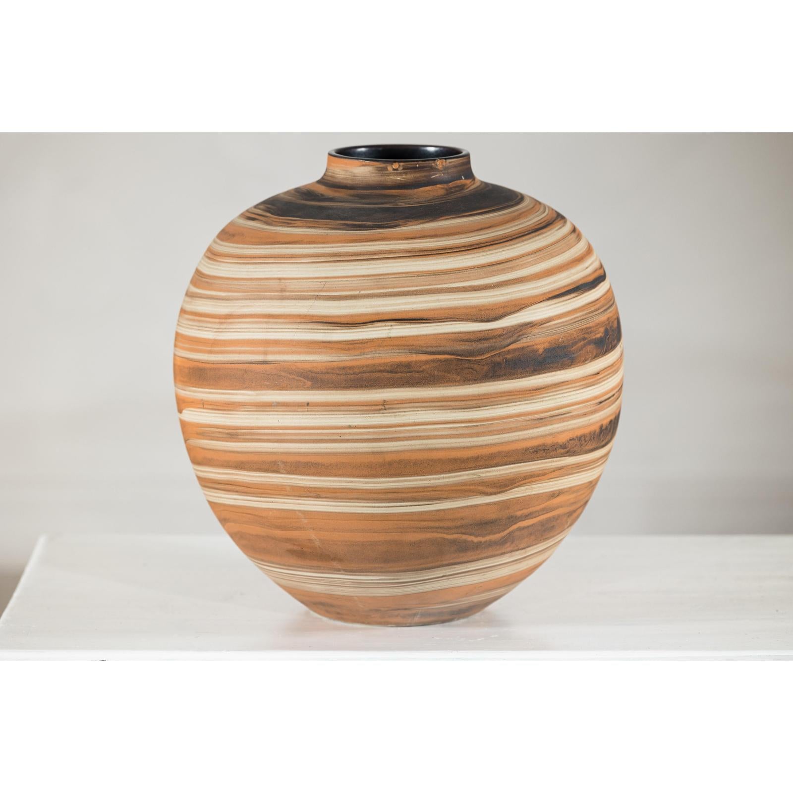 Round Ceramic Artisan Vase with Swirled Earth-Tone Design