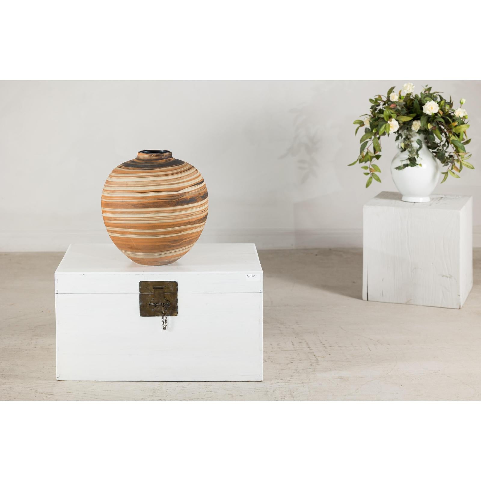 Round Ceramic Artisan Vase with Swirled Earth-Tone Design