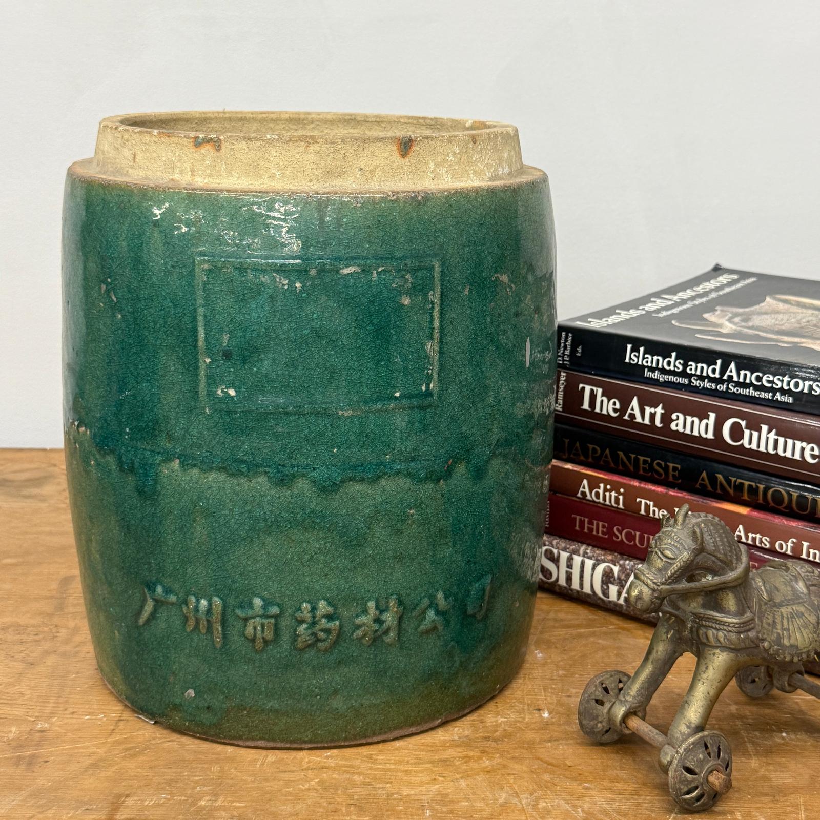 Round Green Glazed Ceramic Jar with Chinese Markings - FEA Home