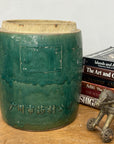 Round Green Glazed Ceramic Jar with Chinese Markings - FEA Home