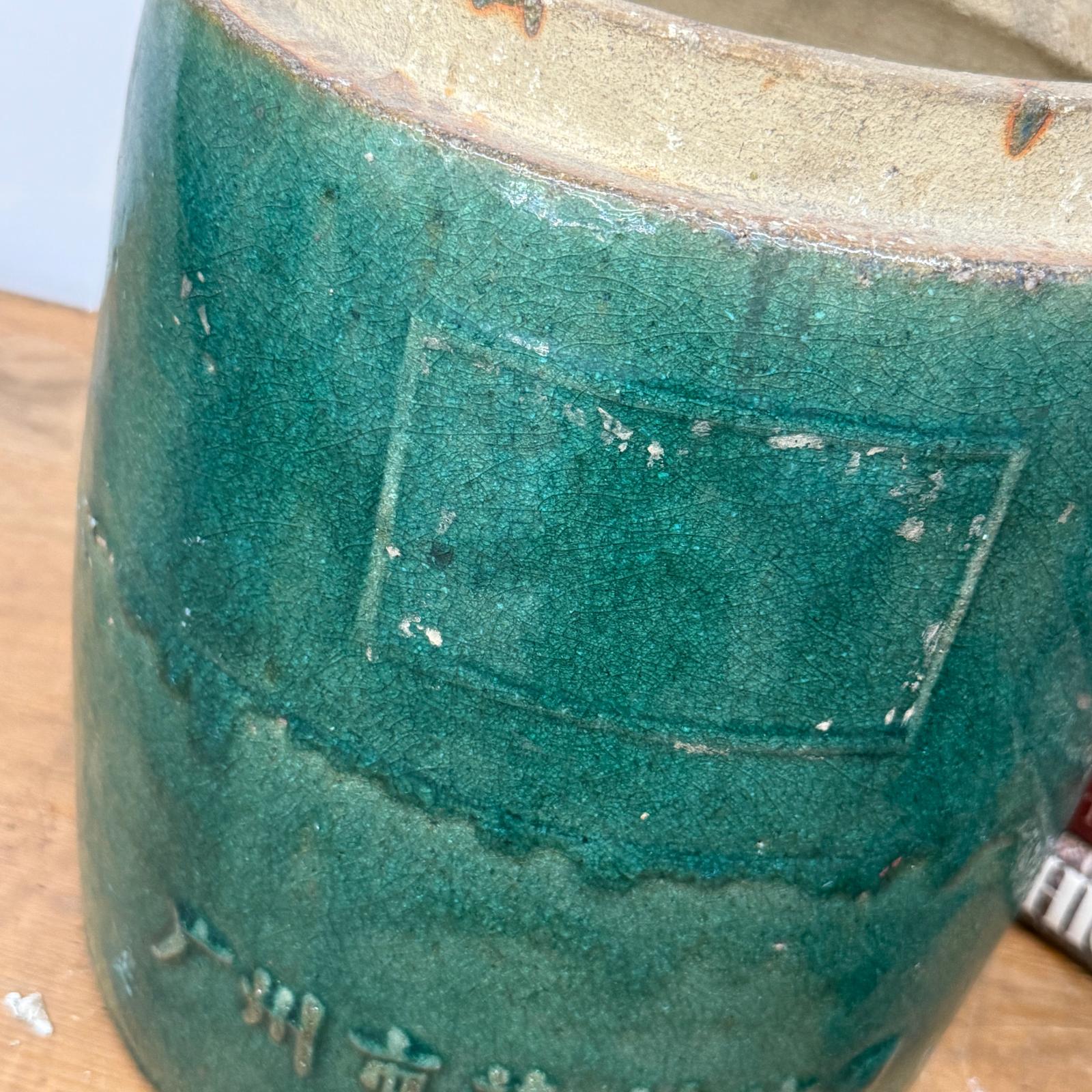 Round Green Glazed Ceramic Jar with Chinese Markings - FEA Home