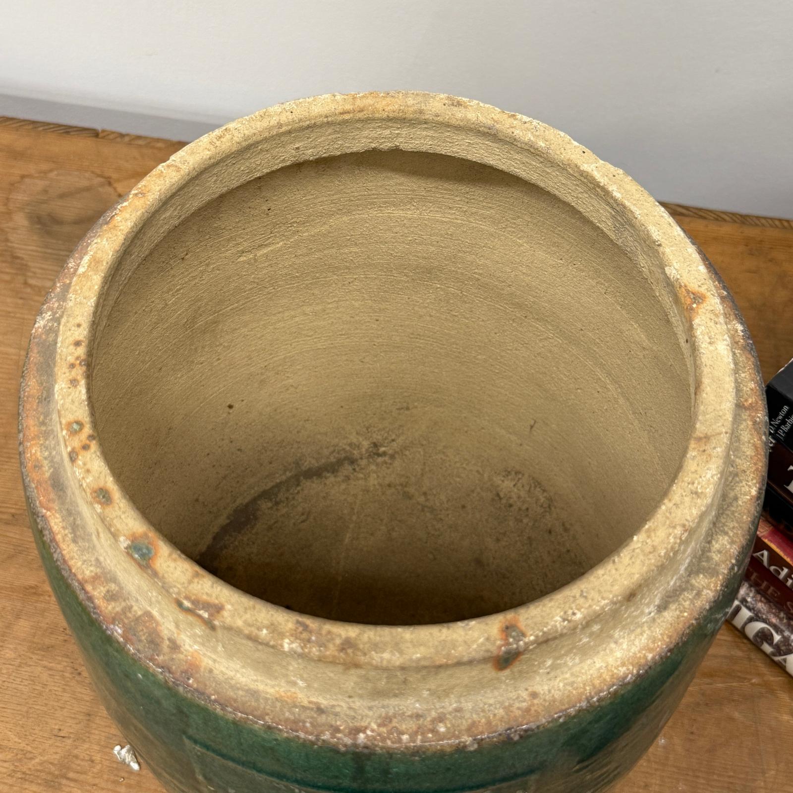 Round Green Glazed Ceramic Jar with Chinese Markings - FEA Home