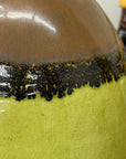 Round Pistachio Green Ceramic Vase with Brown Curved Top - FEA Home