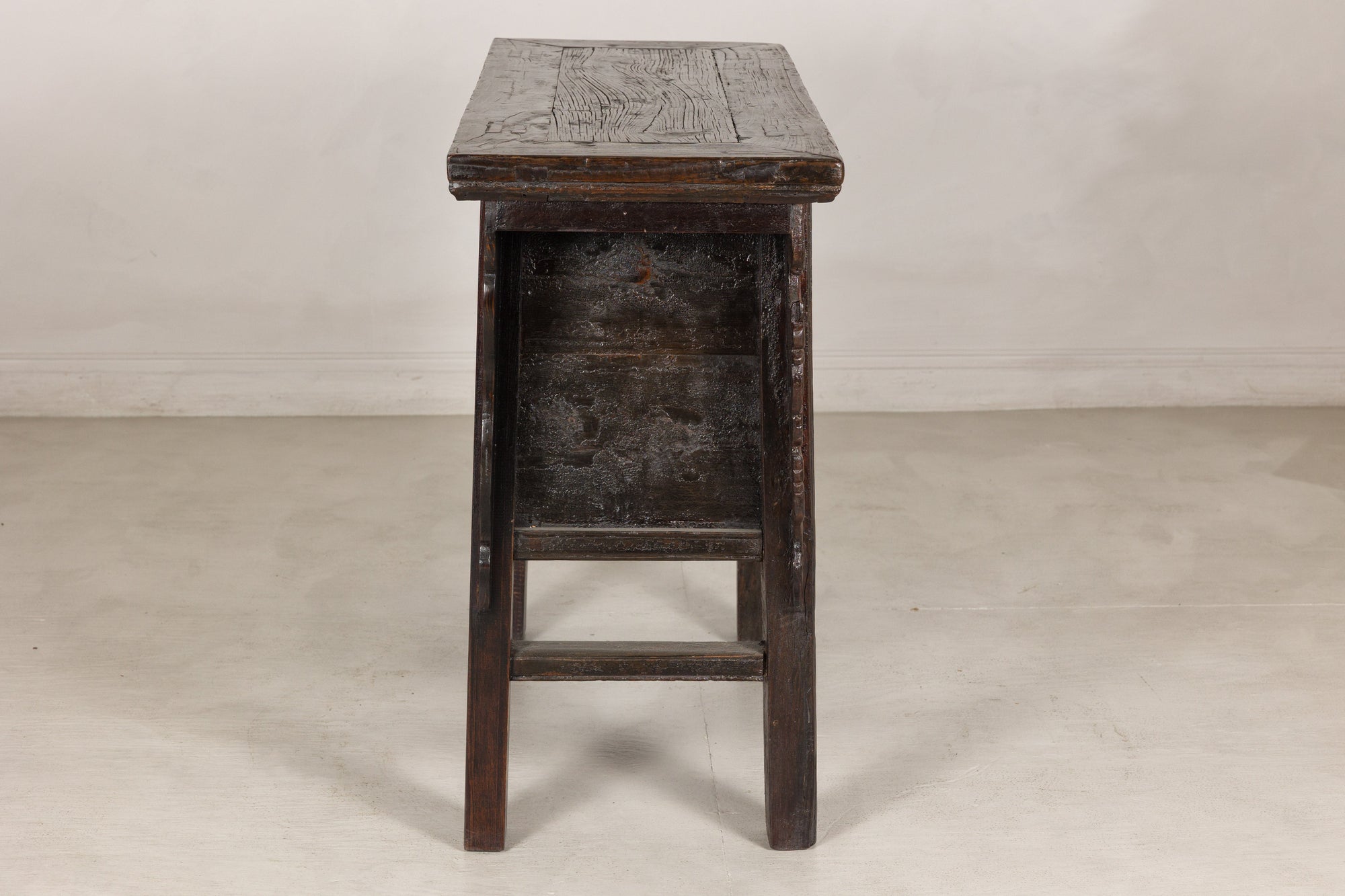 Rustic carved Chinese cabinet, side view