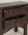 Three-quarter view of cabinet with lower drawer open