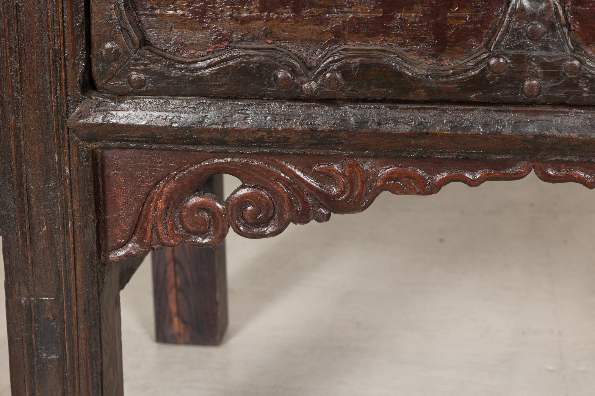 Close-up of carved floral apron