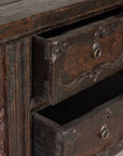 Carved wood cabinet with drawers open