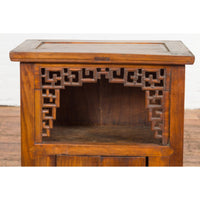 Chinese Qing Dynasty 19th Century Elm Side Cabinet with Fretwork Shelf and Doors