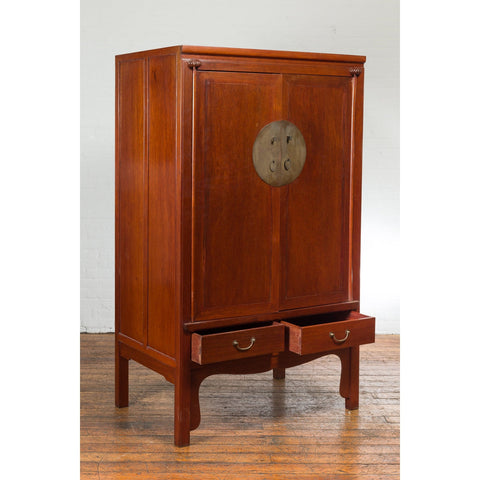 Chinese Qing Dynasty Armoire with Brass Medallion and Reconfigured Pocket Doors