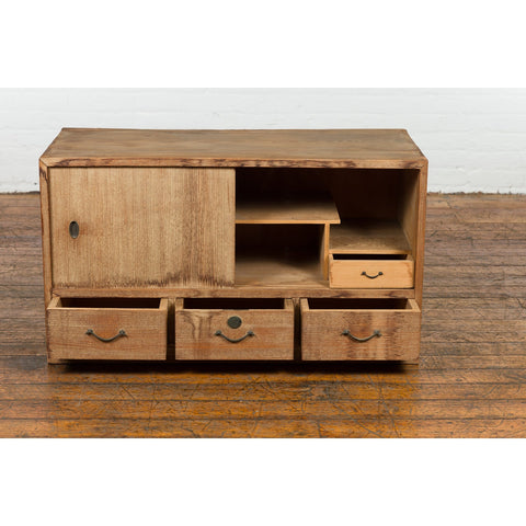 https://feahome.com/cdn/shop/files/shop-japanese-early-20th-century-low-storage-cabinet-with-sliding-doors-and-drawers-2-vintage-and-antique-asian-oriental-and-chinese-furniture-for-sale-at-fea-home-nyc-model-yn7630_large.jpg?v=1698955771