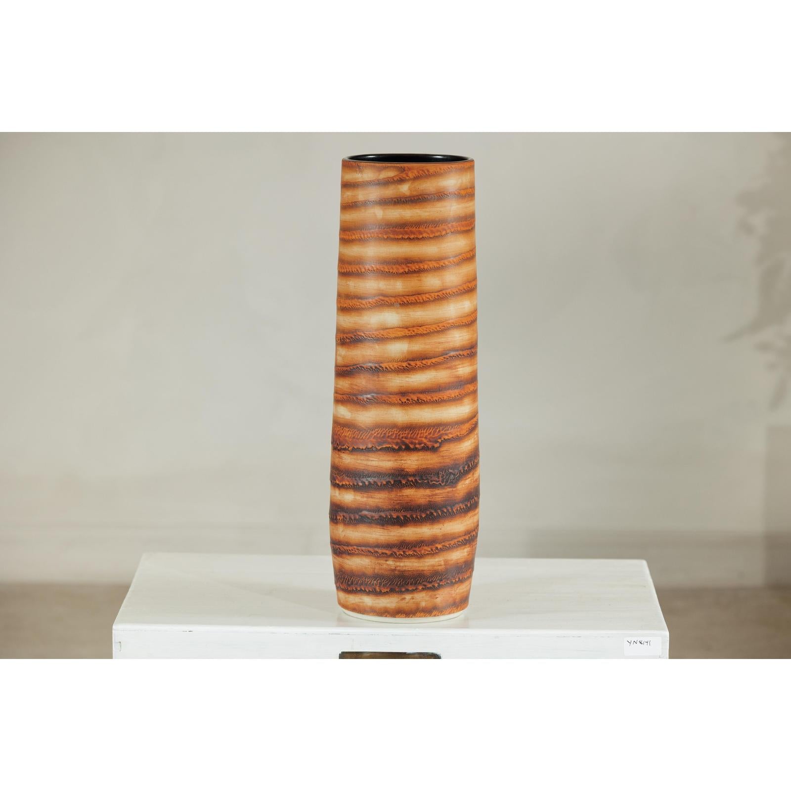 Tall Orange-Brown Artisan Ceramic Vase with Swirl Design
