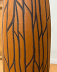 Brown-orange sand ceramic vase with matte finish and black crackle pattern, standing upright.