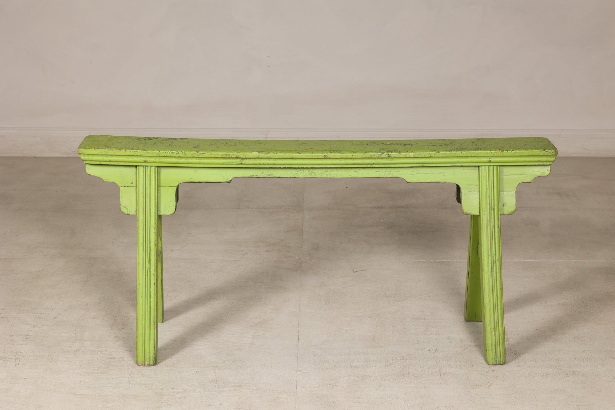 Vintage green wooden bench, rear view