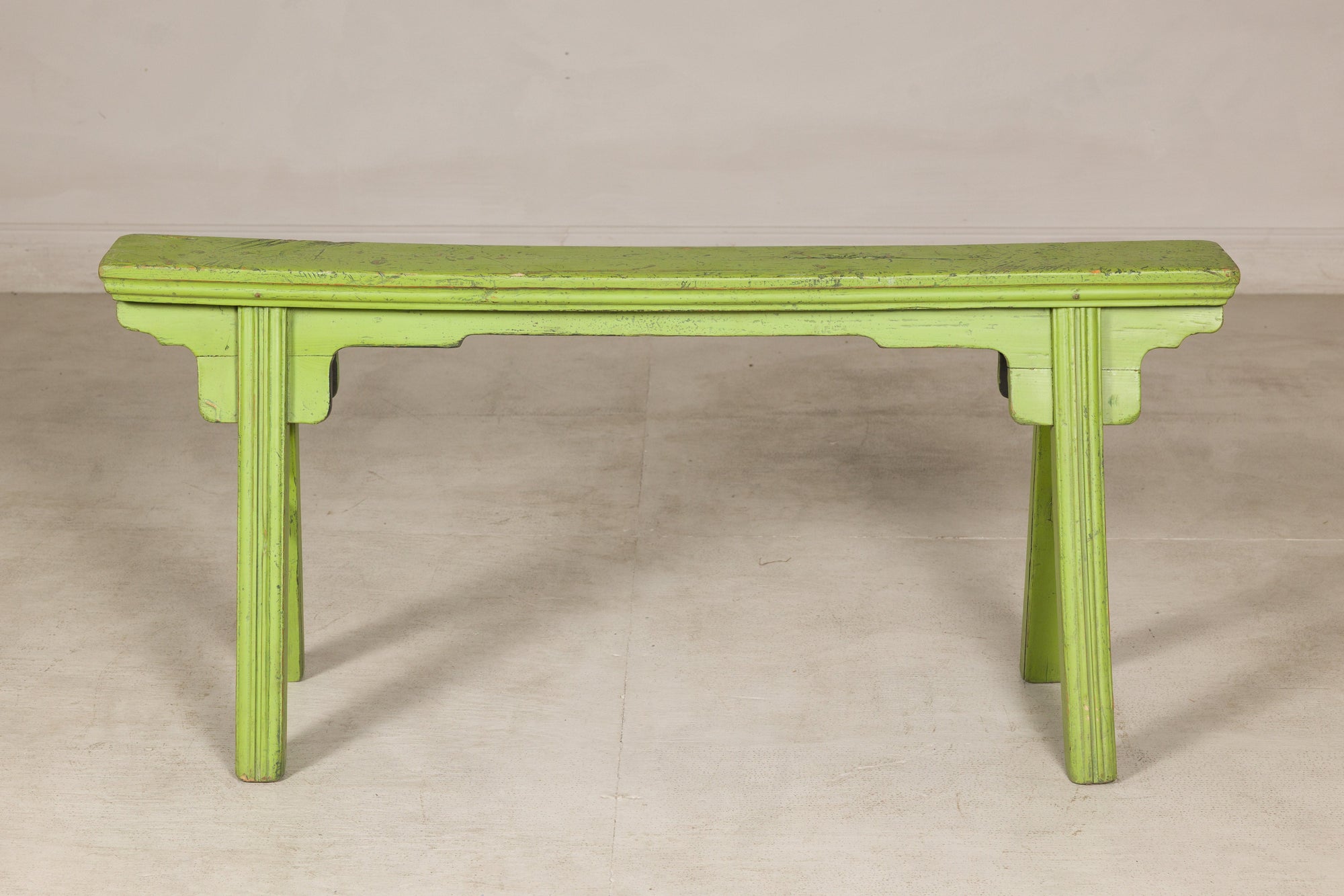 Green painted Chinese bench with curved top, full front view