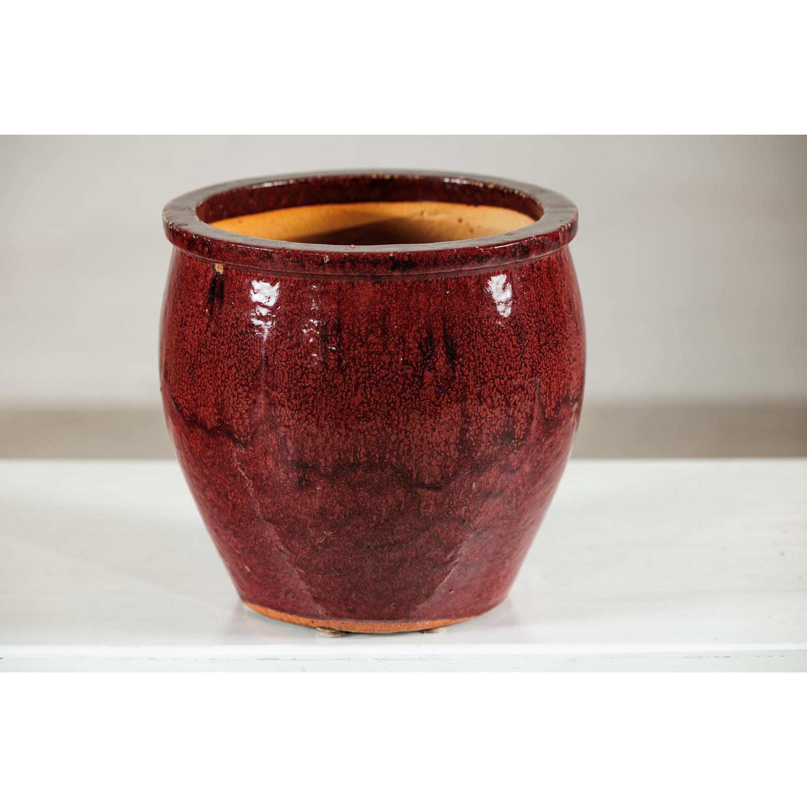 vintage ceramic plant pots Vintage Oxblood Glazed Ceramic Planter with Flared Rim
