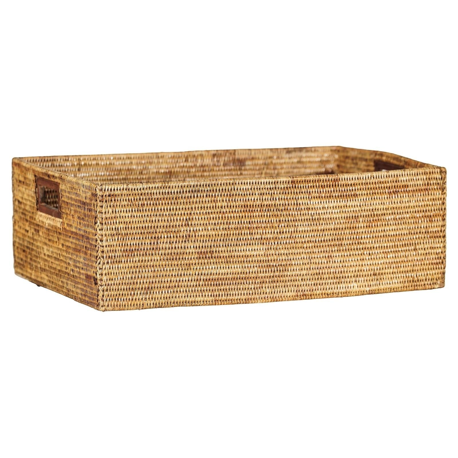 Woven rectangular basket with handles on a white background