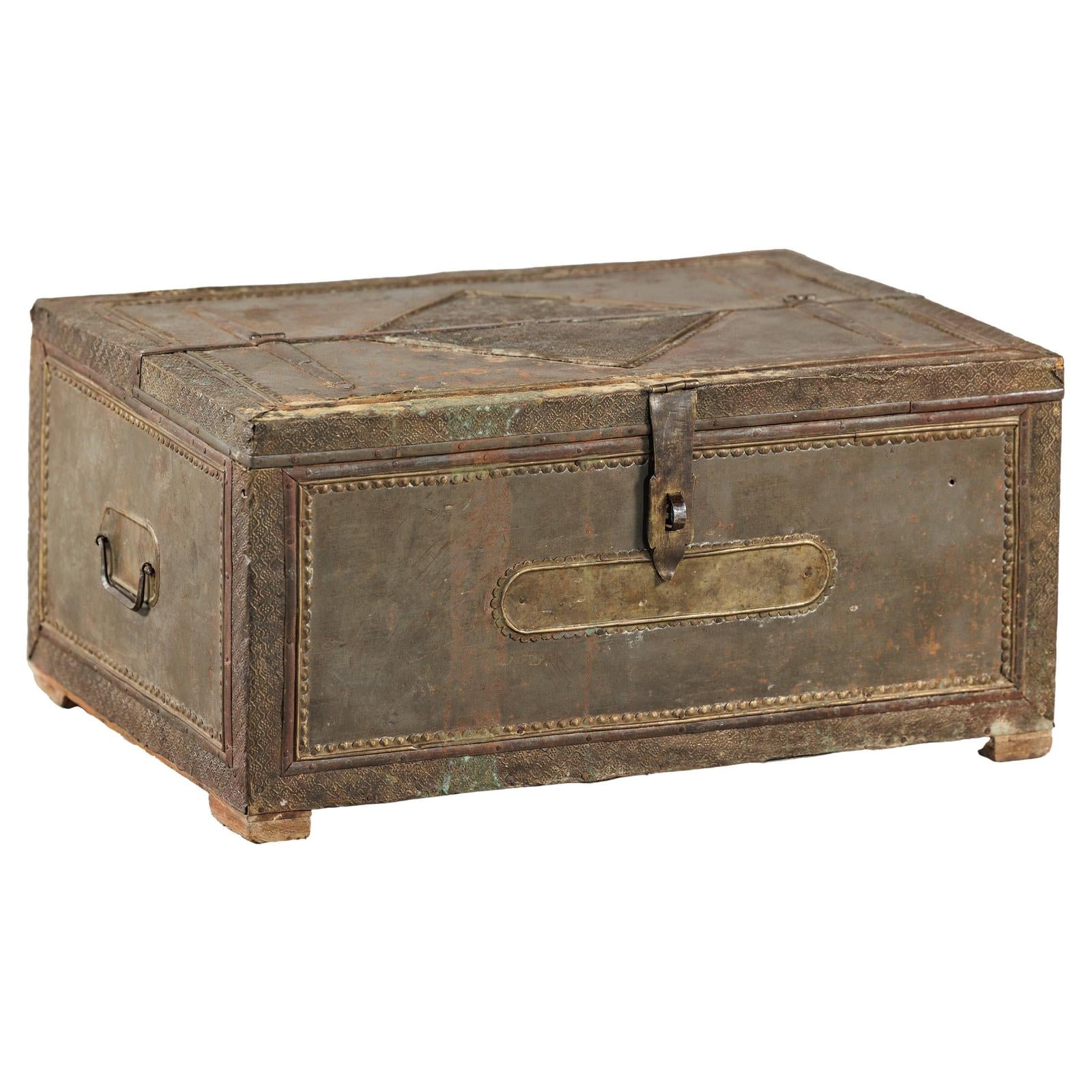 Vintage Tin-Clad Metal Trunk with Embossed Detailing - image 1