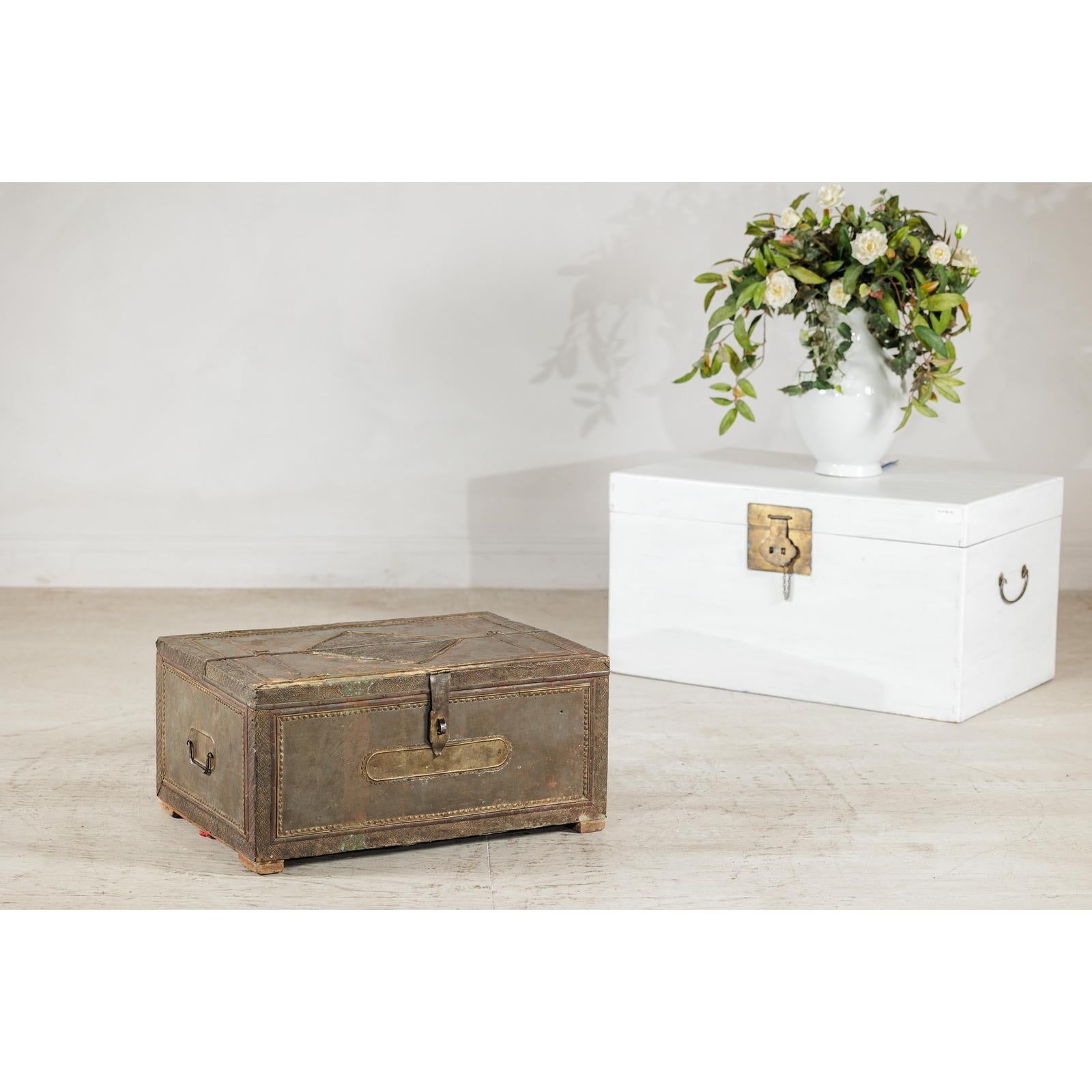 Vintage Tin-Clad Metal Trunk with Embossed Detailing - image 6