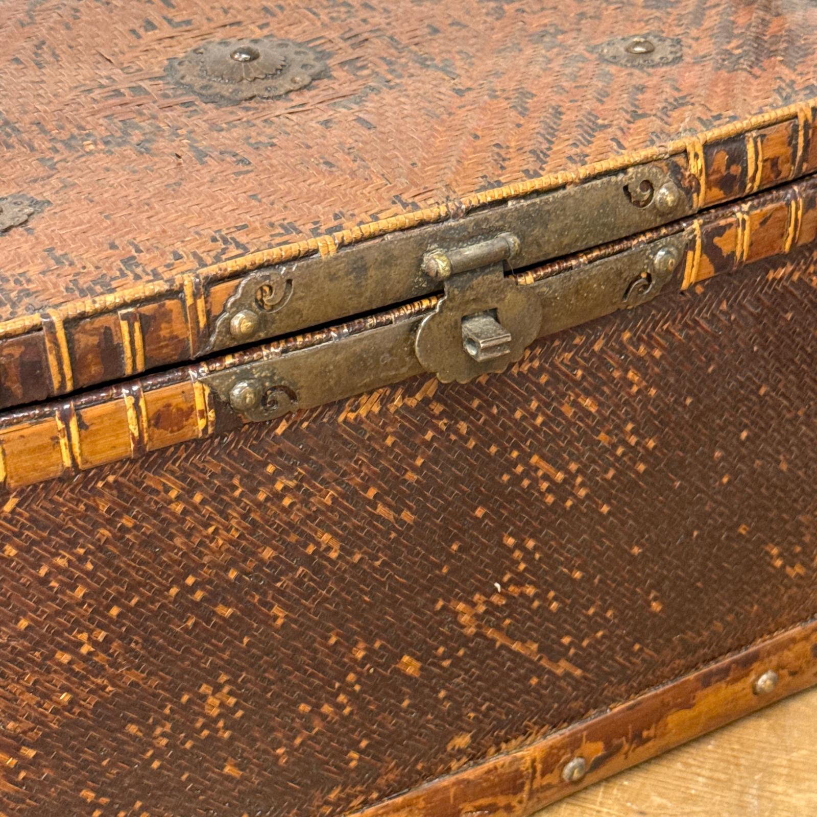 Close-up of the Woven Rectangular Picnic Basket with Handle &amp; Hinged Lid. The unique woven wood pattern and rustic metal clasp showcase Southeast Asian craftsmanship and vintage charm.