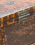 Close-up of the Woven Rectangular Picnic Basket with Handle & Hinged Lid, featuring detailed rattan texture, metal hinge and clasp, and worn edges that reflect its Southeast Asian craftsmanship and vintage charm.