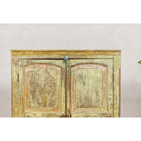 Distressed Green Painted Small Cabinet with Paneled Doors and Two Drawers