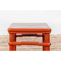 Qing Dynasty 19th Century Red Lacquer Side Table with Humpback Stretcher