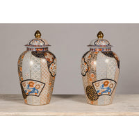 Arita Style Lidded Jars with Gold, Blue and Orange Floral Motifs