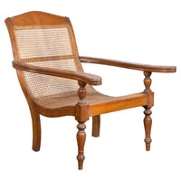 Dutch Colonial Indonesian Cane and Wood Plantation Chair with Extending Arms