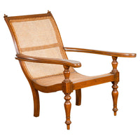 Colonial Period Wood and Rattan Lounge Chair with Extending Arms