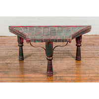 Rustic Red and Green Coffee Table with Trapezoidal Top and Iron Stretchers