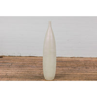 Subtle Ivory Color Tall Vase with Raised Scrolling Motifs and Narrow Mouth