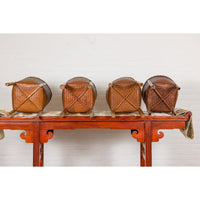 Brown Woven Rattan Baskets With Friezes on Raised Legs