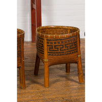 Brown Woven Rattan Baskets With Friezes on Raised Legs