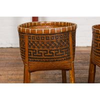 Brown Woven Rattan Baskets With Friezes on Raised Legs