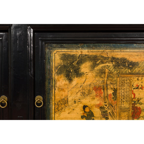 Low Yellow and Black Cabinet with Three Door Paintings