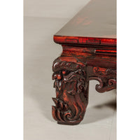 Qing Dynasty Low Kang Coffee Table with Reddish Brown Finish and Carved Décor