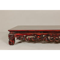 Qing Dynasty Low Kang Coffee Table with Reddish Brown Finish and Carved Décor