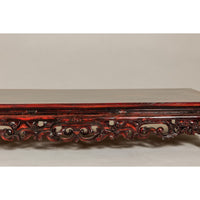 Qing Dynasty Low Kang Coffee Table with Reddish Brown Finish and Carved Décor