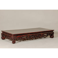 Qing Dynasty Low Kang Coffee Table with Reddish Brown Finish and Carved Décor