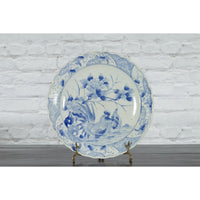 19th Century Blue and White Porcelain Plate Depicting a Rooster and Hen