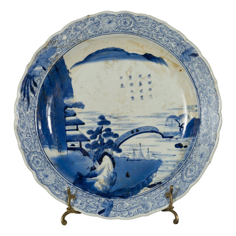 This-is-a-picture-of-a-19th Century Japanese Porcelain Imari Plate with Painted Blue and White Décor-with-image-position-1-style-YNE865-Shop-for-Vintage-and-Antique-Asian-and-Chinese-Furniture-for-sale-at-FEA Home-NYC