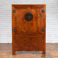Chinese Qing Dynasty 19th Century Armoire with Carved Skirt and Large Medallion