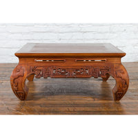 Small Vintage Indonesian Coffee Table with Scroll-Carved Apron and Chow Legs