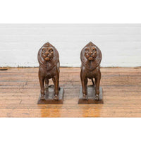 Pair of Bronze Lion Sculptures on Bases with Dark Patina