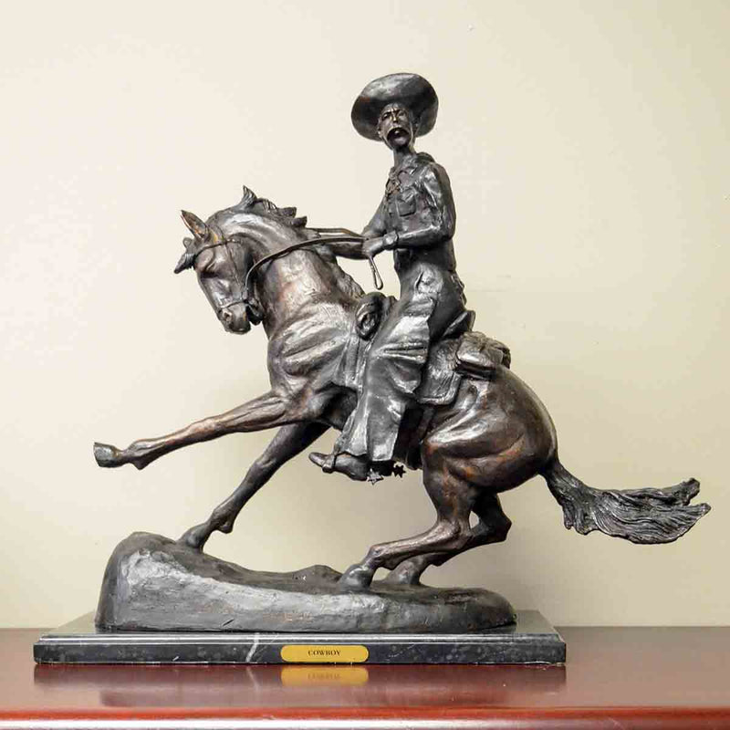 Cowboy Sculpture on Marble Base, after Frederic Remington