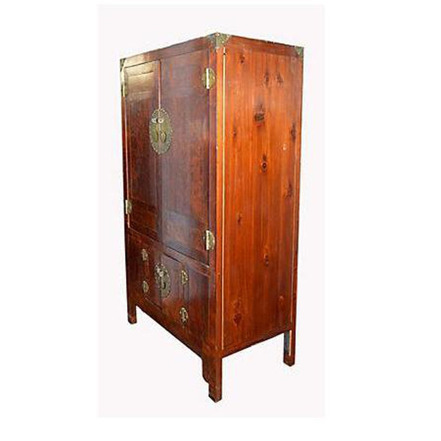 Stained burlwood Chinese armoire with four doors and brass hardware, 19th century, front view.